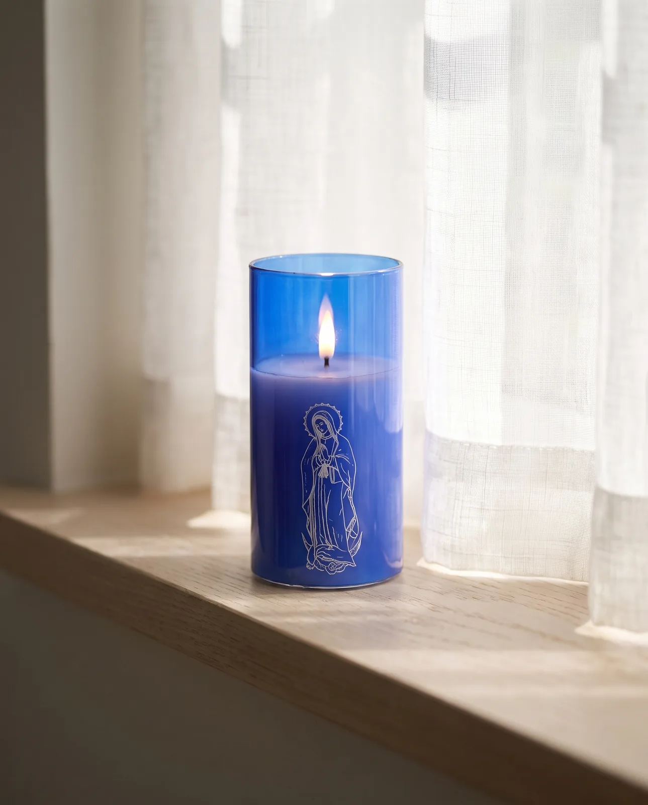 St. Mary candle, blue glass, scene